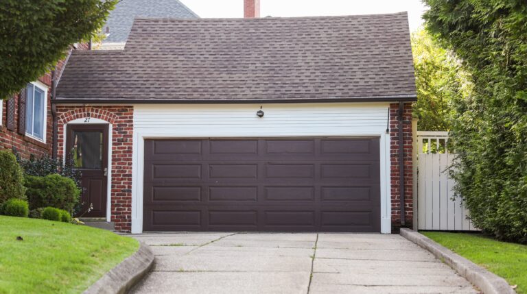 Hire a Garage Door Installer: What Springs, Openers, and a New Door Actually Cost